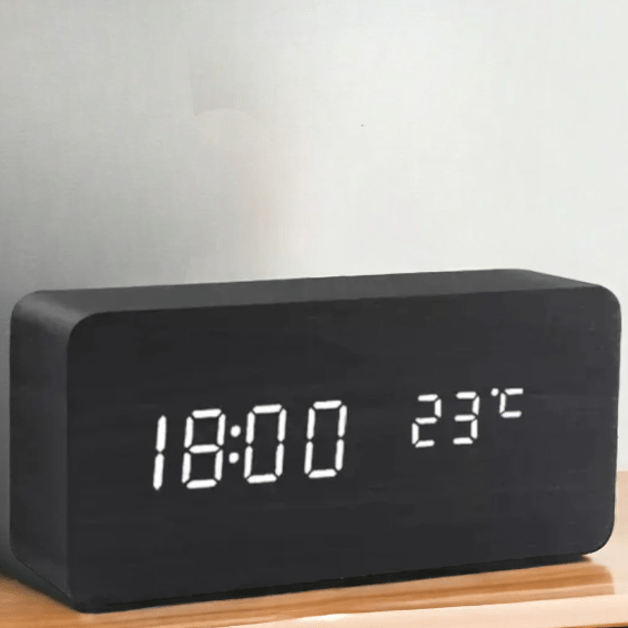 Smart wooden digital clock with bright LED numbers & sound activation, ideal for any room.