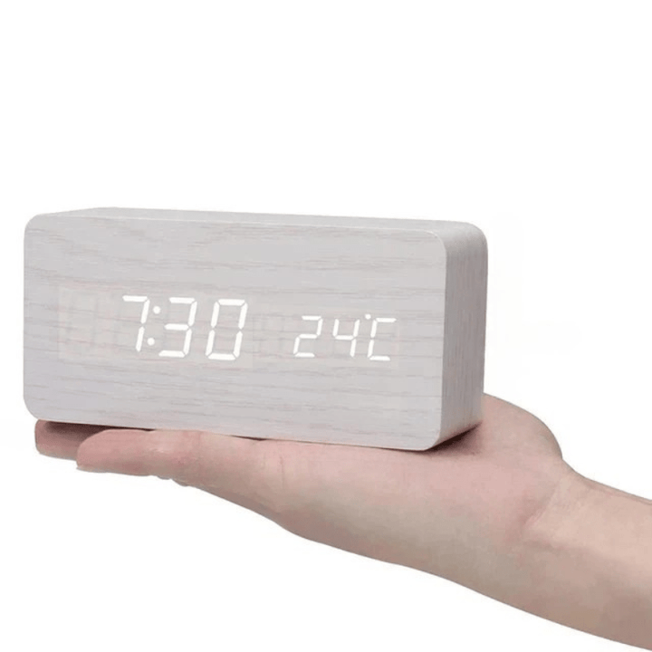 Home decor accent: minimalist wooden LED clock, digital display with smart voice control.