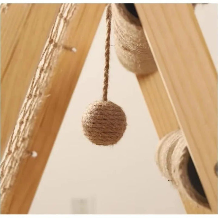 Tall cat tower made of natural wood, perfect for climbing and scratching with sisal post.