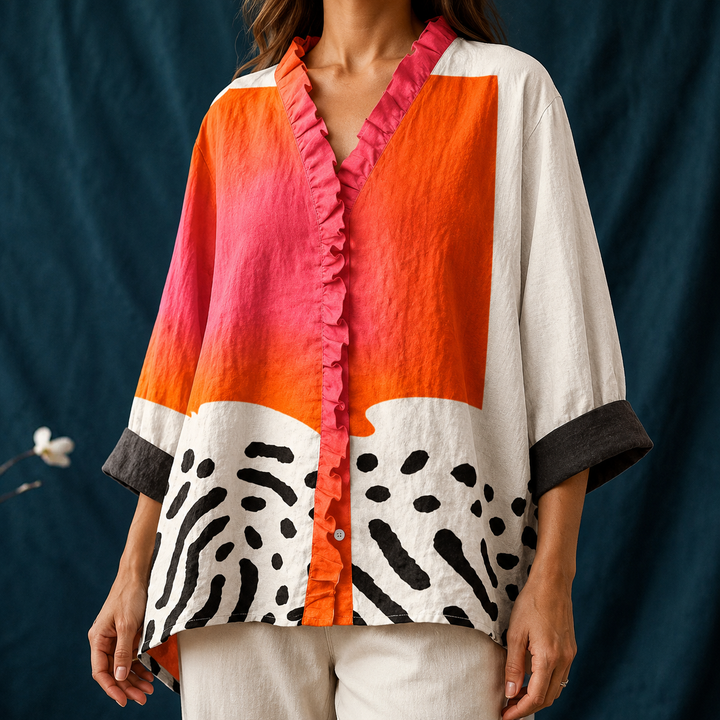 Women's summer shirt: a relaxed fit, button-up abstract block blouse with long sleeves and a playful multicolor design.