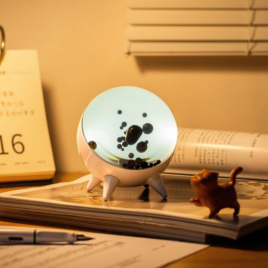 Music-reactive ferrofluid display, an interactive art piece with dynamic visuals for modern decor.