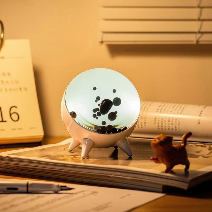 Music-reactive ferrofluid display, an interactive art piece with dynamic visuals for modern decor.