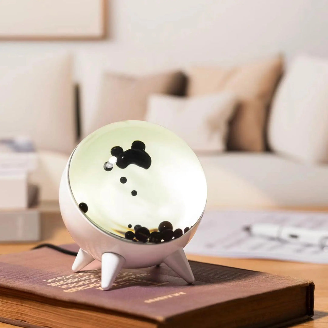 Interactive ferrofluid display, music-reactive, offering dynamic visuals & sensory decor for your home.