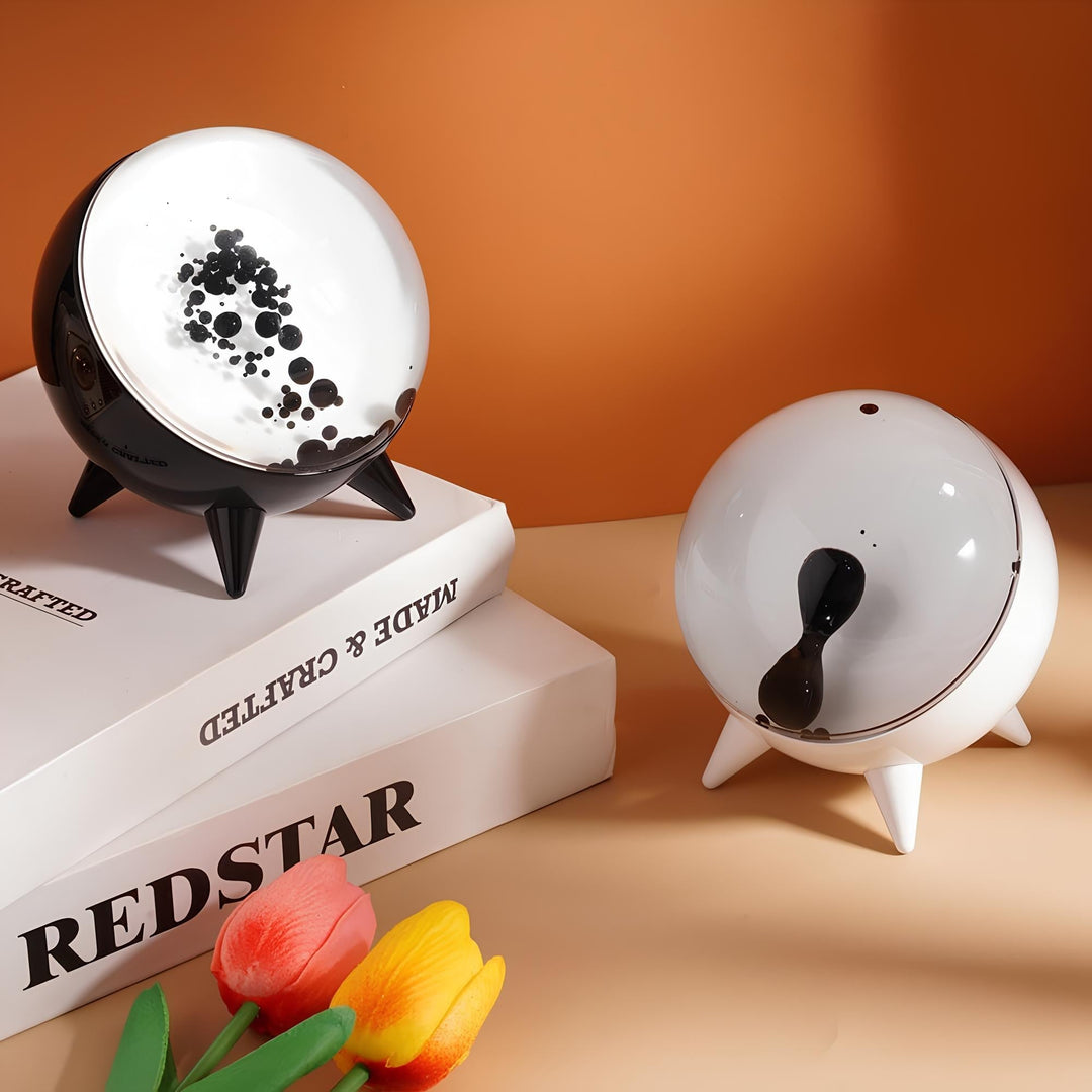 Interactive ferrofluid art display, music-reactive, creating dynamic visuals & modern home decor.