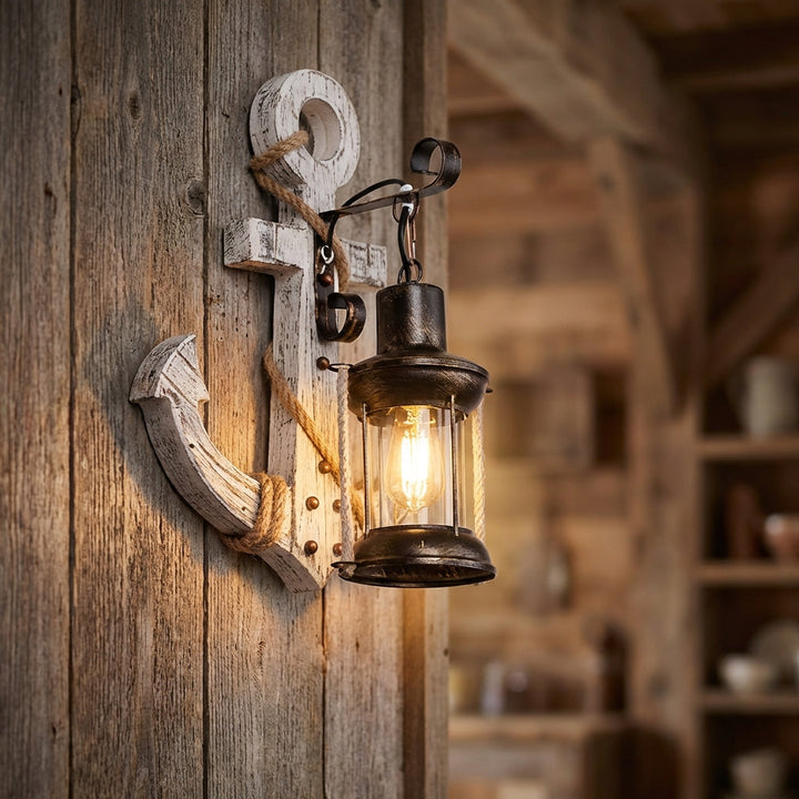 Nautical Anchor LED Wall Sconce with lantern glow. Coastal decor, rustic wood & iron fixture for home lighting.