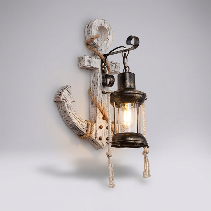 Coastal Anchor LED Wall Sconce. Rustic wood & iron nautical lighting for seaside style homes. Ambient lantern glow.