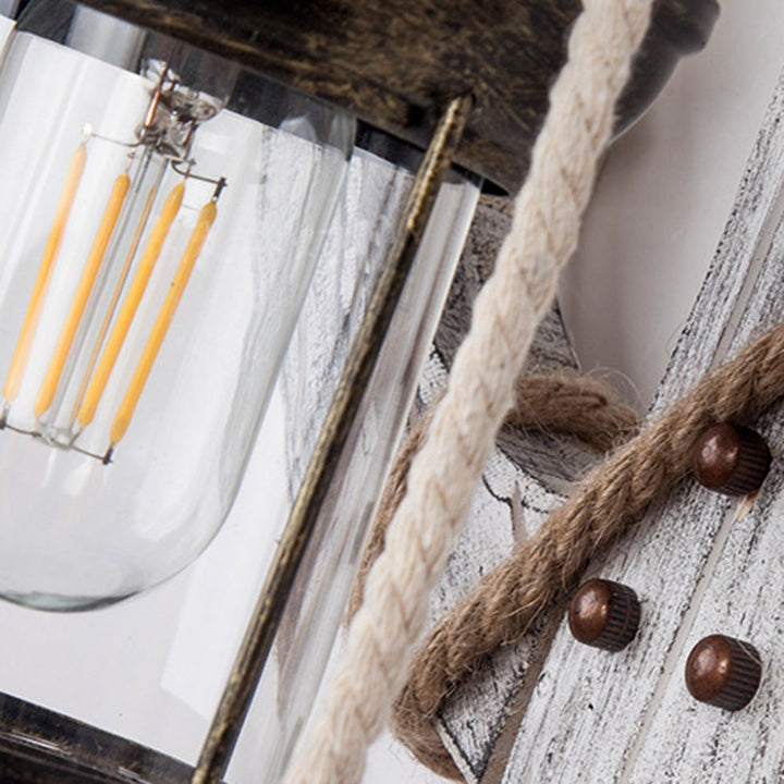 Coastal decor Anchor LED Wall Sconce. Nautical home lighting with a soft lantern glow. Rustic wood & iron design.