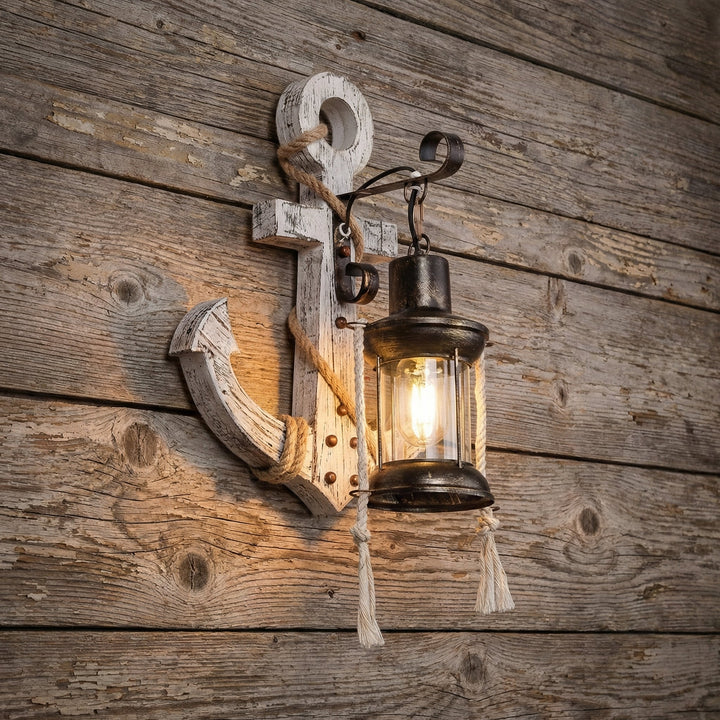 Elegant LED Anchor Wall Sconce. Coastal decor, nautical design with ambient lantern glow. Rustic wood & iron fixture.