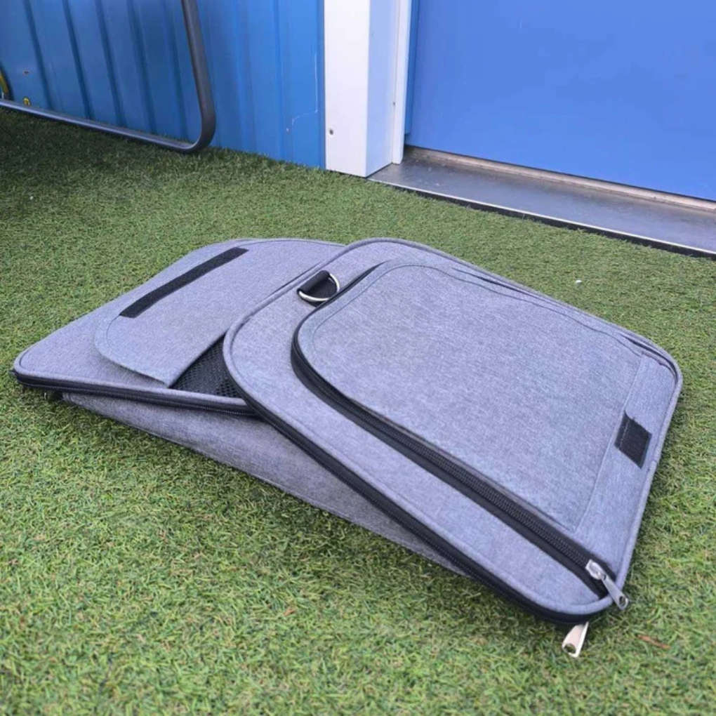 Durable pet carrier for small dogs and cats, designed for comfortable and secure travel.