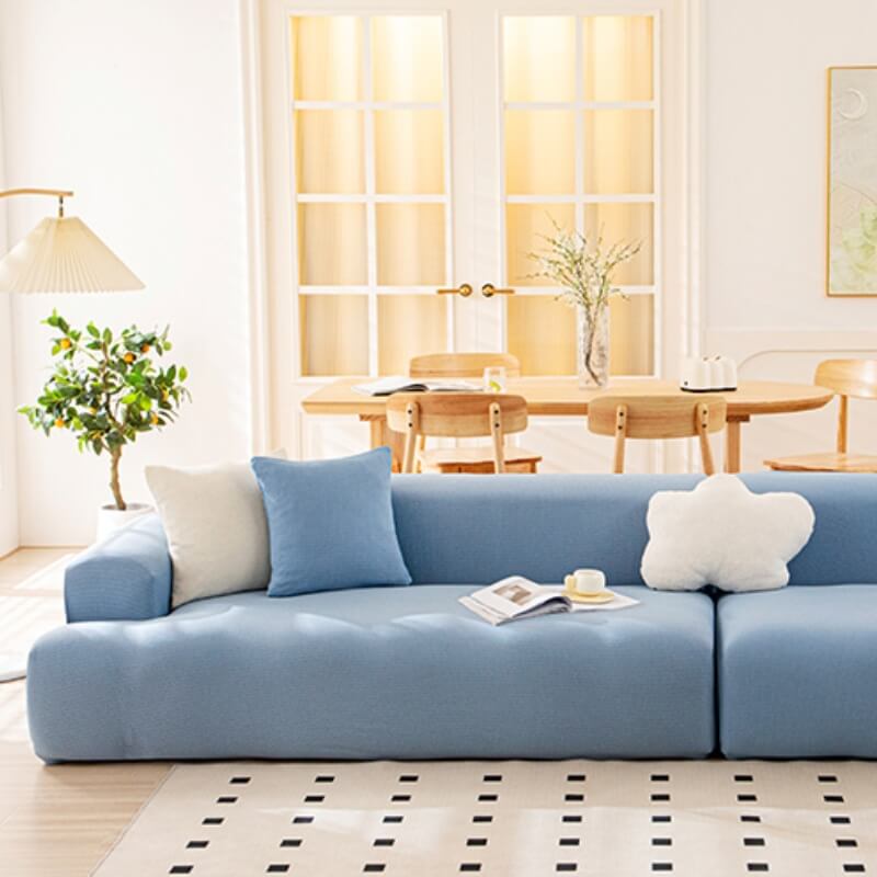 Textured pattern on a blue waterproof couch cover, offering both protection and style