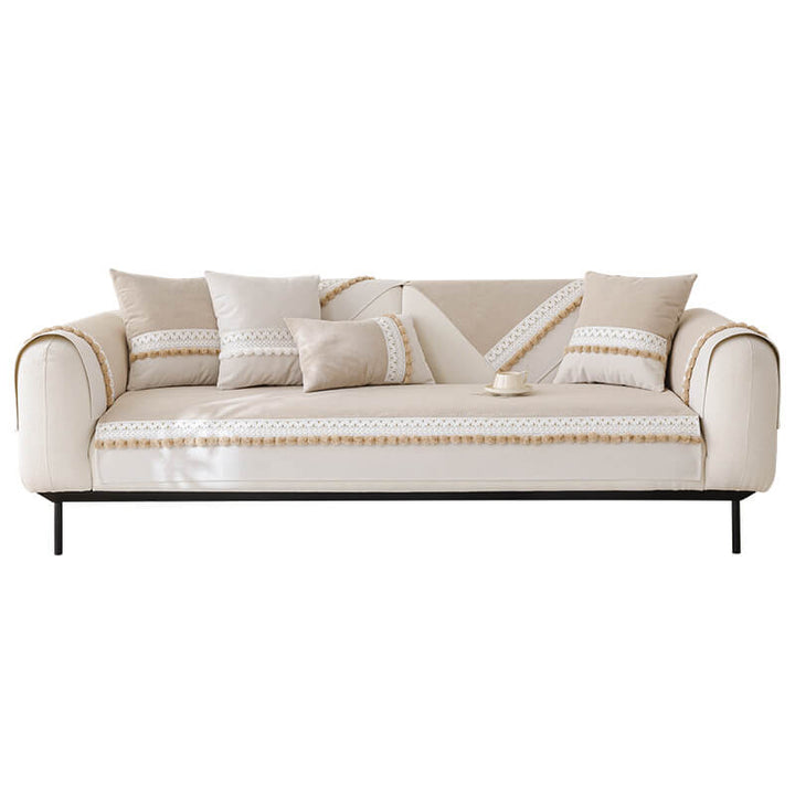 Assortment of colorful corduroy couch covers with playful pom-poms, durable and pet-friendly.