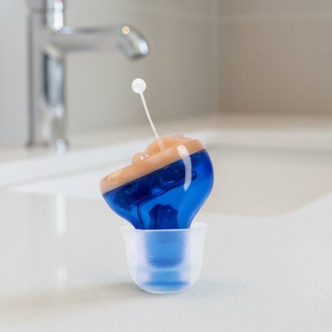 Nearly undetectable in-ear hearing aids for discreet wear & clear sound. Invisible audio enhancement.