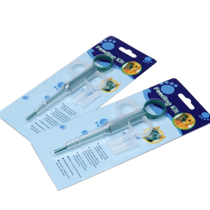 Pet feeding tool, needle-free syringe for administering liquid food or medication to pets