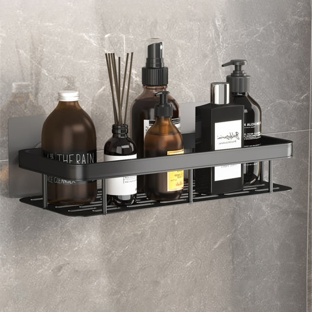 No-drill metal bathroom shelf with strong suction cups for easy shower organization.