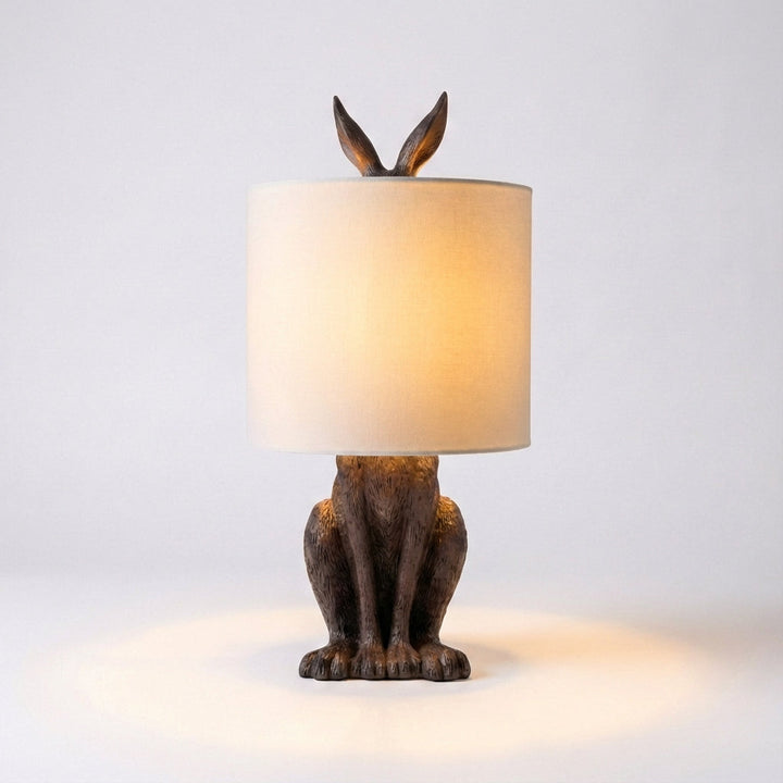 Whimsical masked animal accent lamp. Contemporary resin sculpture acts as an art piece & ambient light for modern decor.