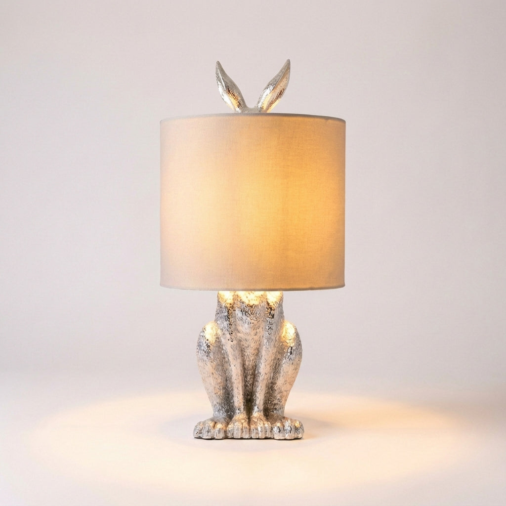 Resin masked animal accent lamp, Noctebelle. Modern table lamp casting a warm, ambient glow for stylish home decor.