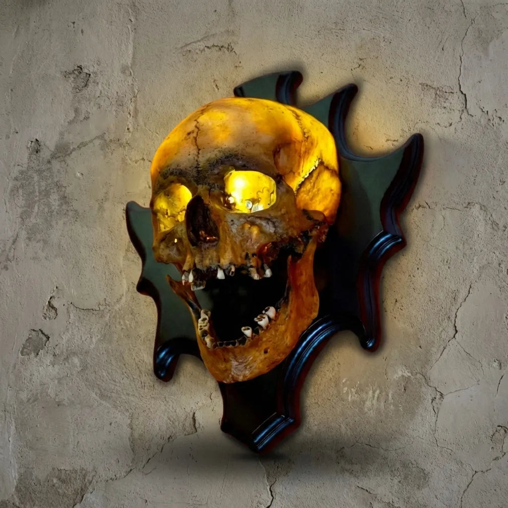 Close-up of the resin Eerie Wall Mounted Skull Lamp, perfect for gothic decor, Halloween, or haunted house lighting.