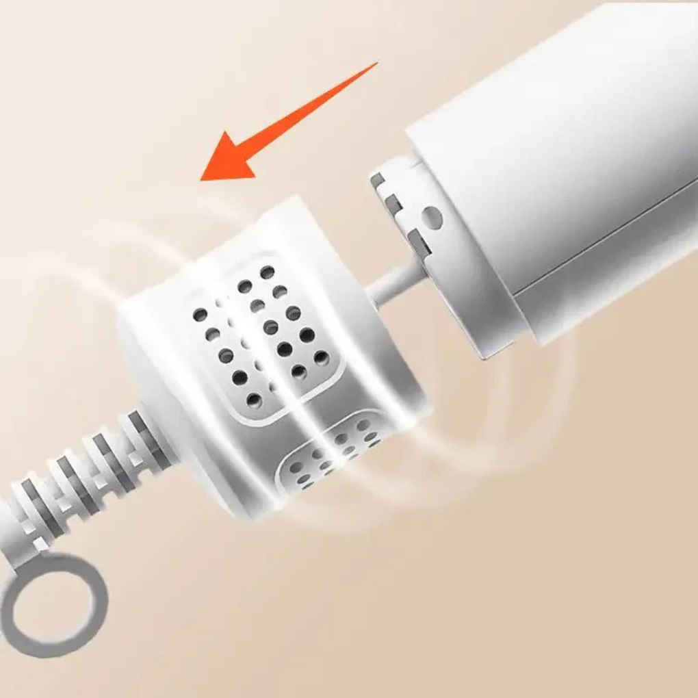 Close-up of the New4 Noko 2-in-1 pet dryer & brush, featuring a quiet operation for dogs and cats.