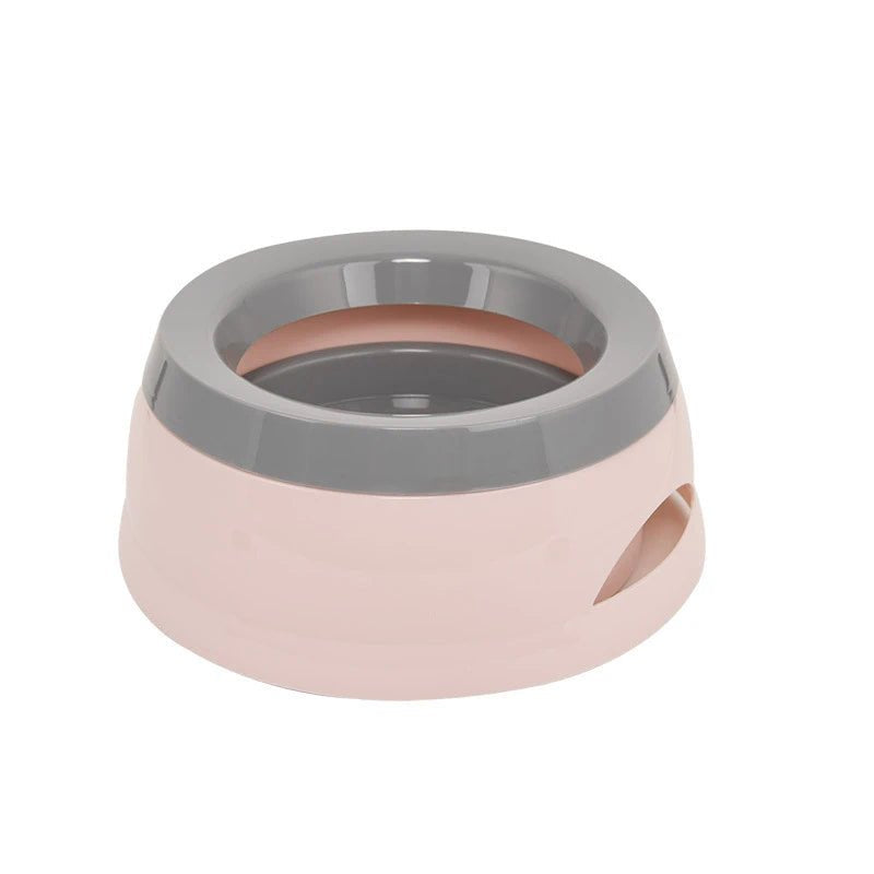 Non-slip anti-spill pet drinking bowl with a sturdy base, perfect for active cats and dogs during travel