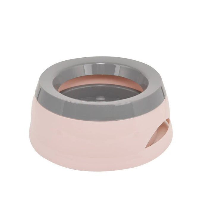 Non-slip anti-spill pet drinking bowl with a sturdy base, perfect for active cats and dogs during travel