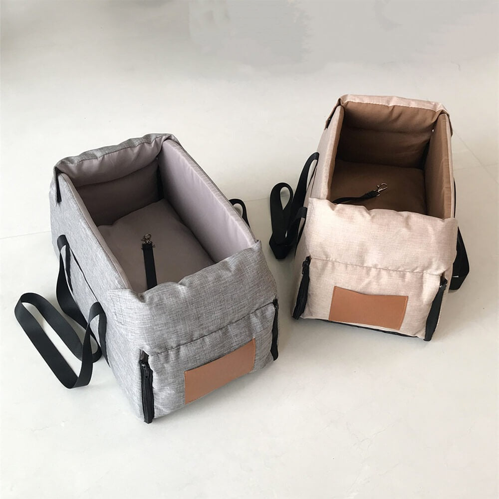 Secure pet travel bed, non-slip base, designed for cats & small dogs, easy to clean.