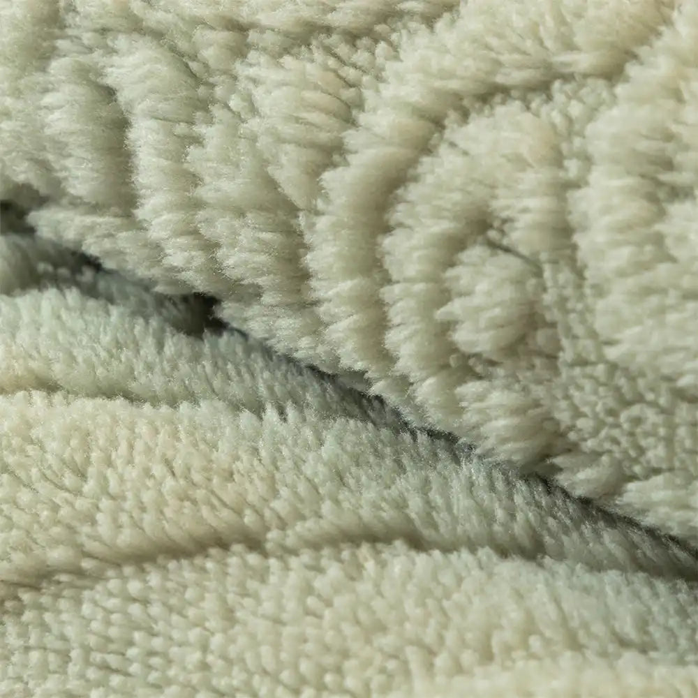 Sectional sofa covered with a plush Nordic design protector, featuring non-slip grip