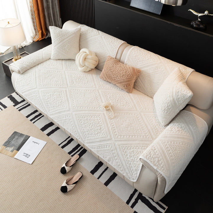 Full view of a living room with a Nordic style plush non-slip sofa cover installed