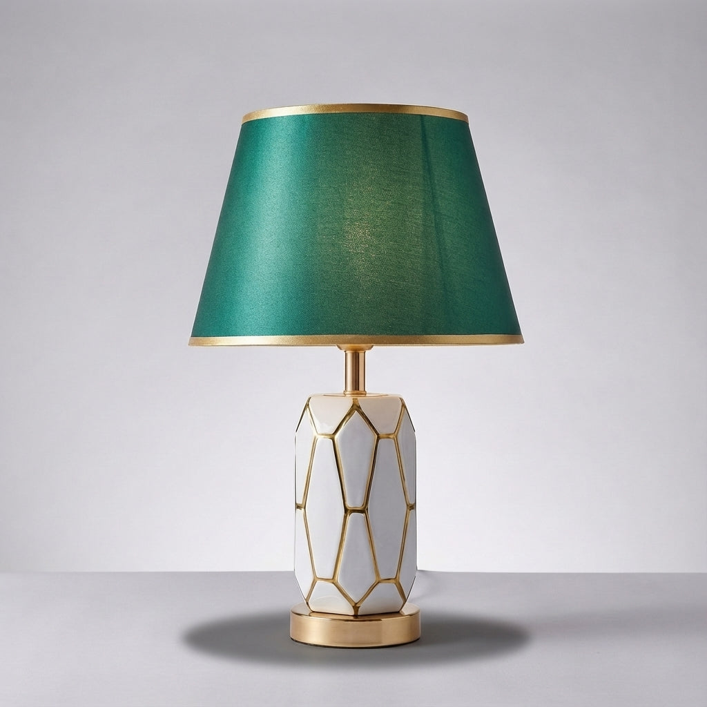 Beautiful ceramic table lamp, clean design, provides gentle ambient lighting for a cozy bedroom or sophisticated living room.