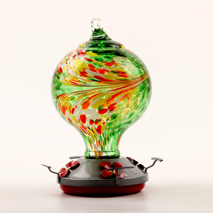 Multiple Ocean Blue Hand Blown Glass Hummingbird Feeders displayed as charming garden decor gifts