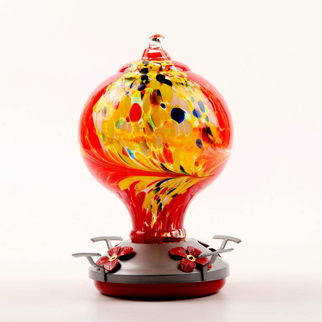 Ocean Blue Hand Blown Glass Hummingbird Feeder on a white background, highlighting its intricate design