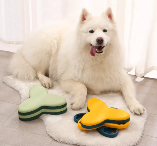 Orange interactive dog feeder toy for mental stimulation, durable pet training enrichment.