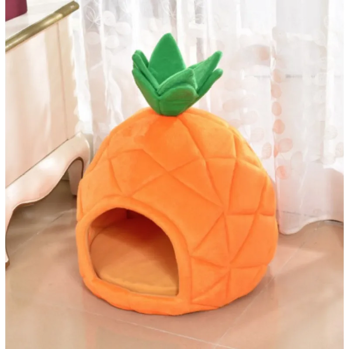 Stylish pineapple pet bed, an enclosed cozy cat bed or small dog bed in vibrant orange.