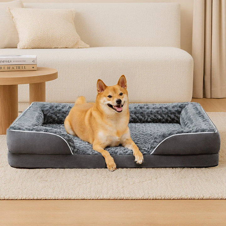Cozy pet furniture: washable orthopedic dog bed with high-density foam for ultimate comfort.