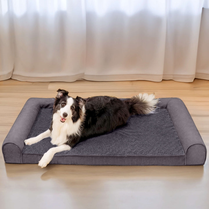High-quality orthopedic dog bed with full supportive bolster, suede accents