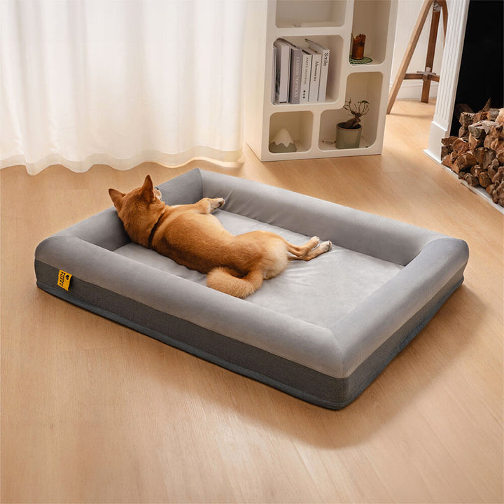 Grey orthopedic dog bed providing excellent joint support for pets.