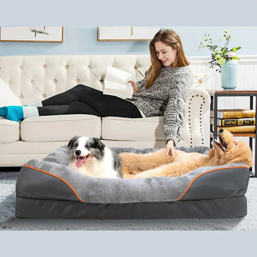 Washable dog bed with bolstered edges for head support, perfect for any pet, grey color.