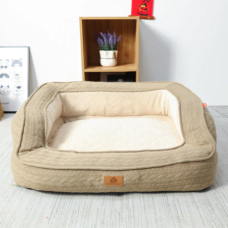 Close-up of the orthopedic dog bed's supportive foam and soft, washable cover.