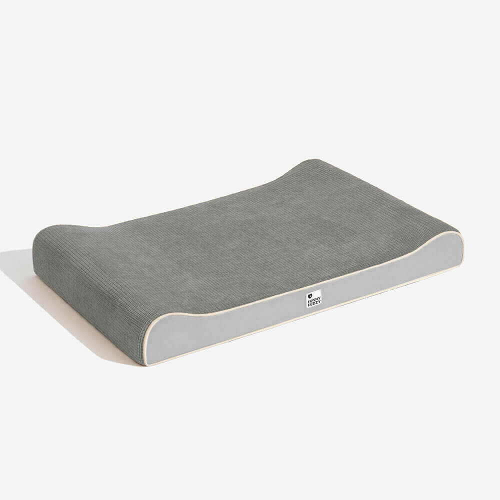 Product shot of the orthopedic dog lounge bed, highlighting its plush comfort and joint support features.