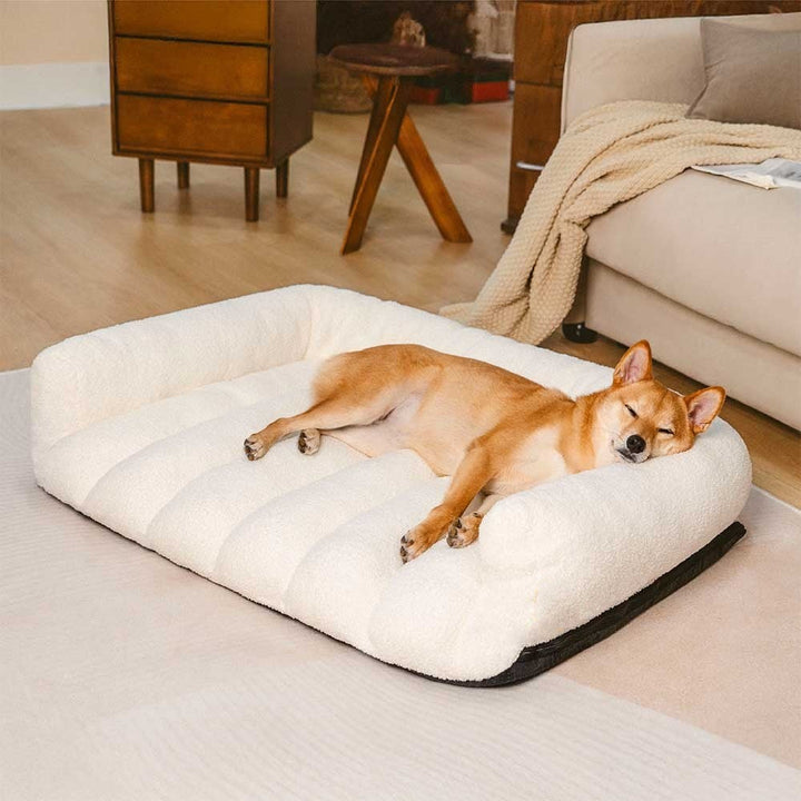 Dark brown orthopedic dog sofa bed, designed with soft headrest for superior joint support.