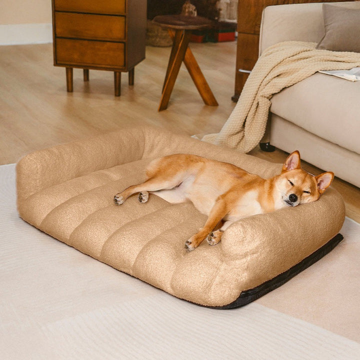 White orthopedic dog bed with plush headrest, providing excellent joint support for dogs.