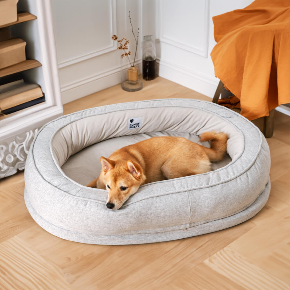Premium orthopedic donut dog bed, crafted for anxiety relief and joint support.