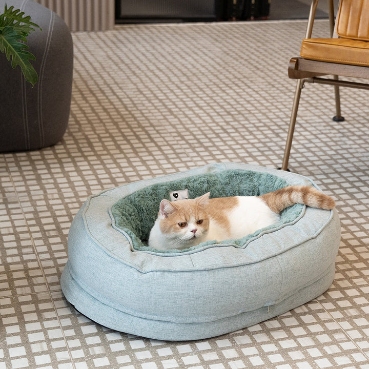 Cozy orthopedic donut dog bed, designed for maximum pet relaxation and support.