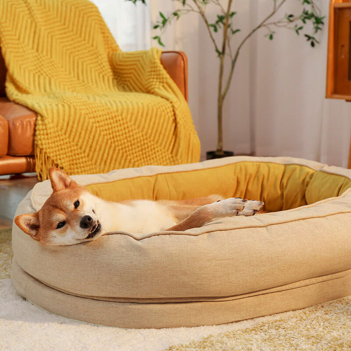 Waterproof orthopedic donut dog bed, ideal for both large and small dogs.