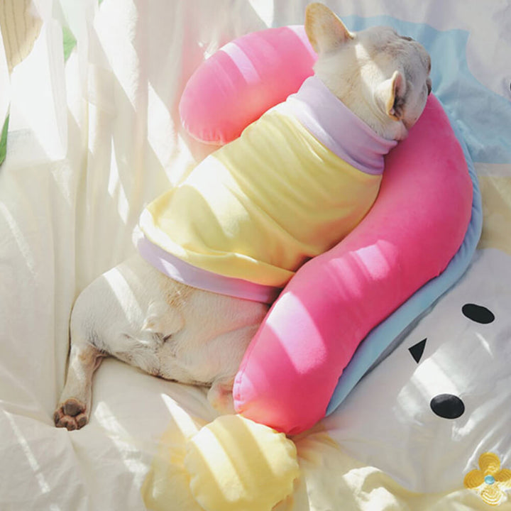 Orthopedic pet sleep pillow in a modern macaron style, providing essential spine support for animals.