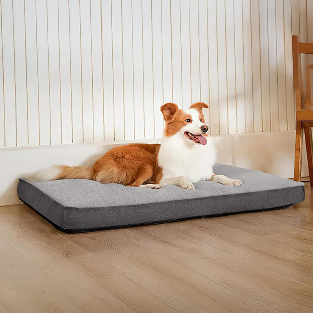 Large orthopedic memory foam dog bed in beige, waterproof and easy to clean for pets.