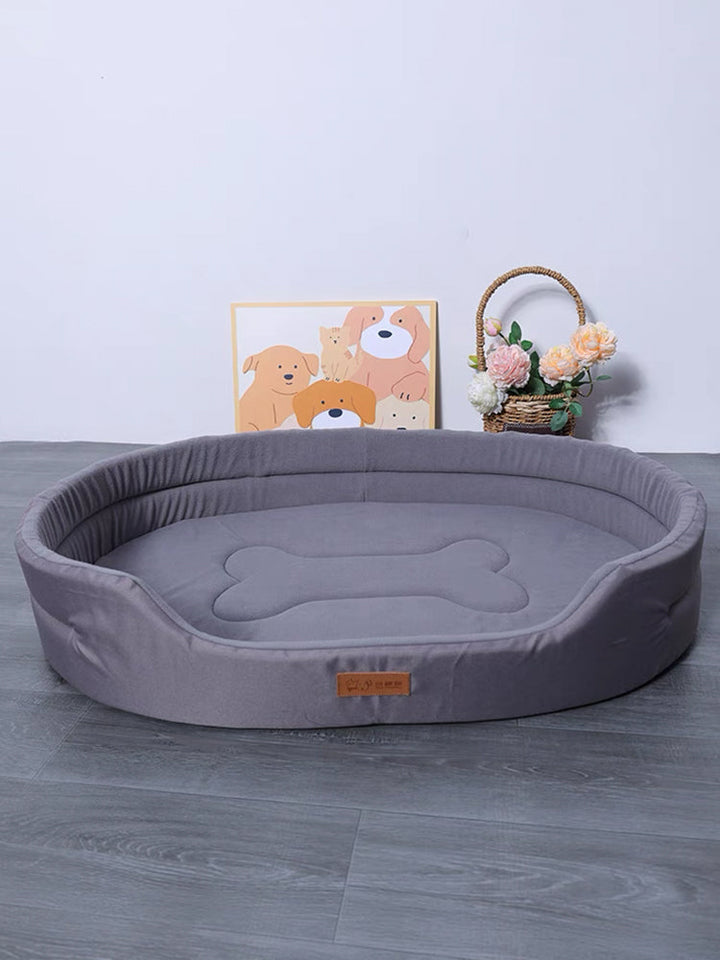 Orthopedic memory foam dog bed with breathable cover, provides joint support for pets.