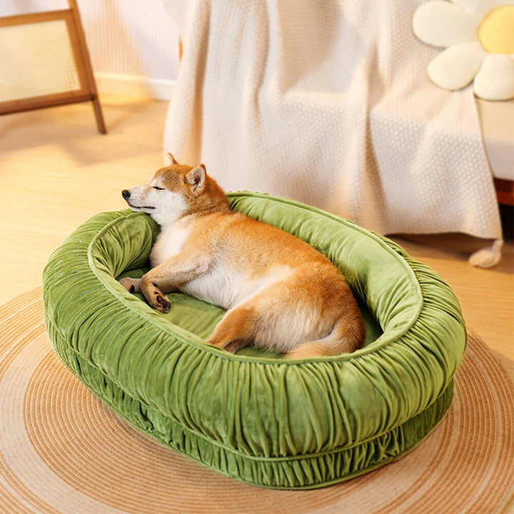 Supportive orthopedic pet bed, oval shape, with a plush velvet removable cover for easy washing.