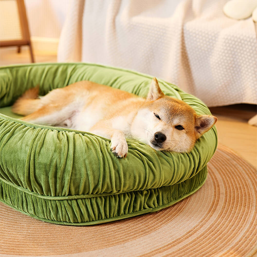 Soft pet calming bed, orthopedic design, oval, with a removable cover, perfect for anxious pets.