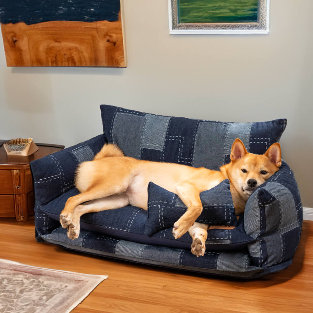 Plush lambswool top on a denim style double layer pet bed, ideal for cats and small dogs