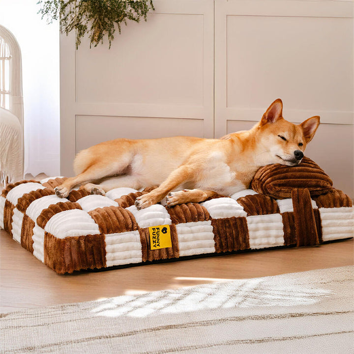 Orthopedic plush chessboard dog bed with a soft pillow, offering comfort for pets.